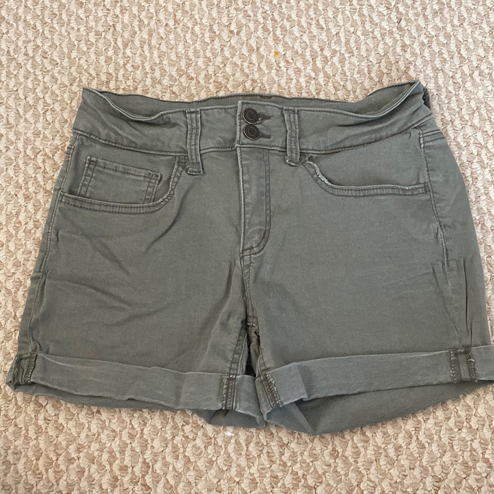 Darker green denim jean shorts. Junior size 9.